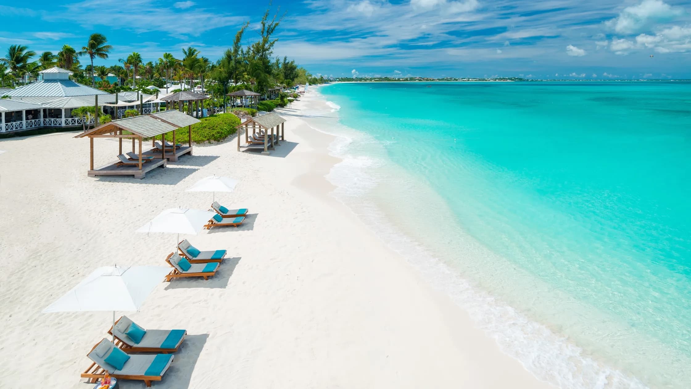 Aerial view of Grace Bay Beach with its stunning turquoise waters and white sand